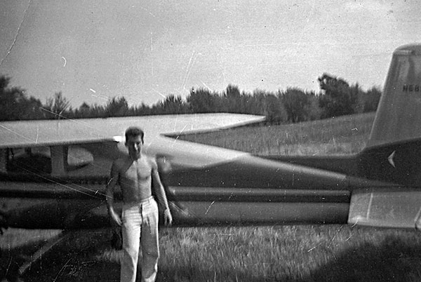 Art Gagnon standing in front of plane that landed on their property